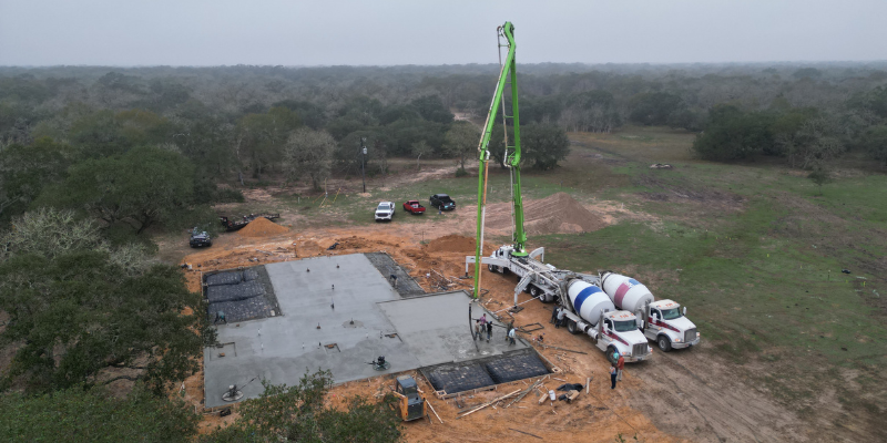 metal building concrete pour site access equipment