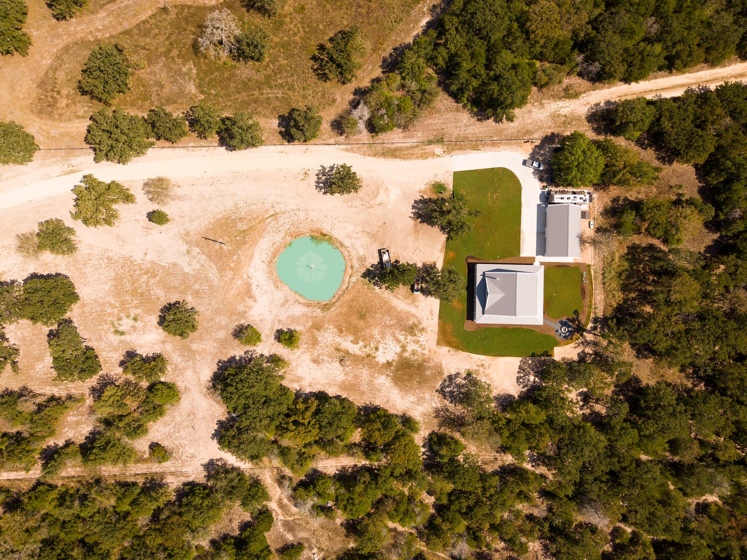anderson-tx-barndominium-acreage-pond-overhead