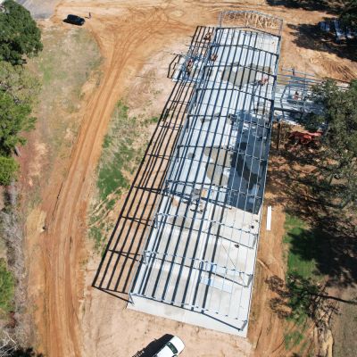 metal-building-frame-erection-drone-view-columbus-tx