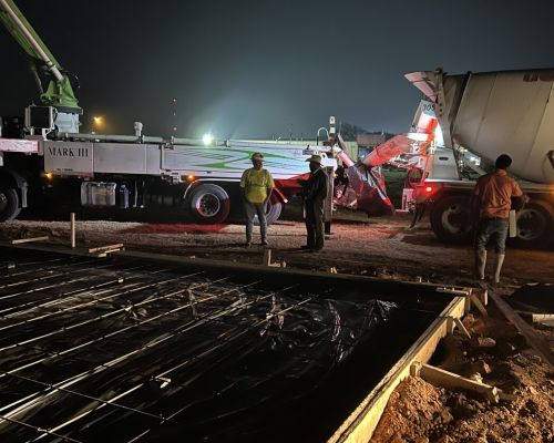 40x100x16-commercial-service-facility-night-concrete-pour-columbus-tx