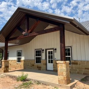 custom-metal-building-stone-wainscot-timber-entry-texas.jpg
