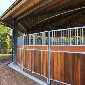 custom-horse-stall-barn-hardwood-panels-metal-framing.jpg