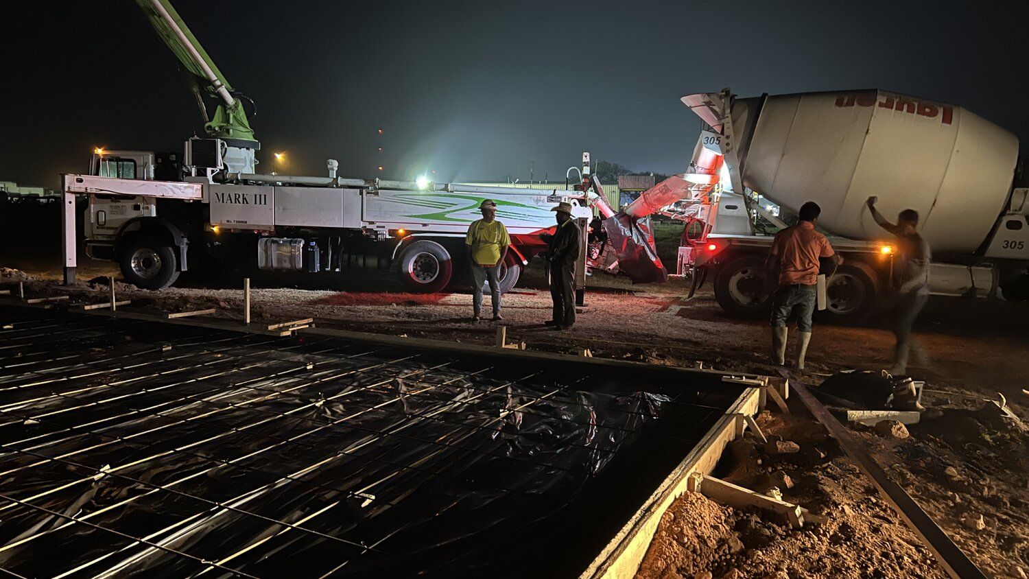 40x100x16-commercial-service-facility-night-concrete-pour-columbus-tx