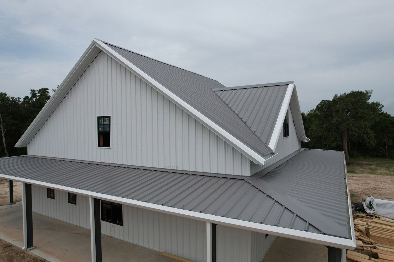 cross-gable-metal-roof-custom-home-college-station-texas