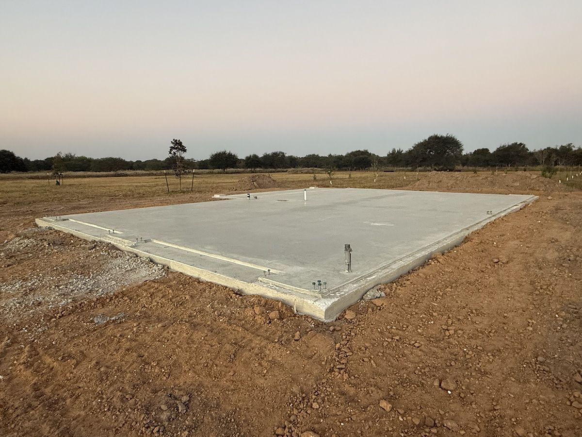 30x50x14-barndominium-roll-up-door-front-view-columbus-tx-5