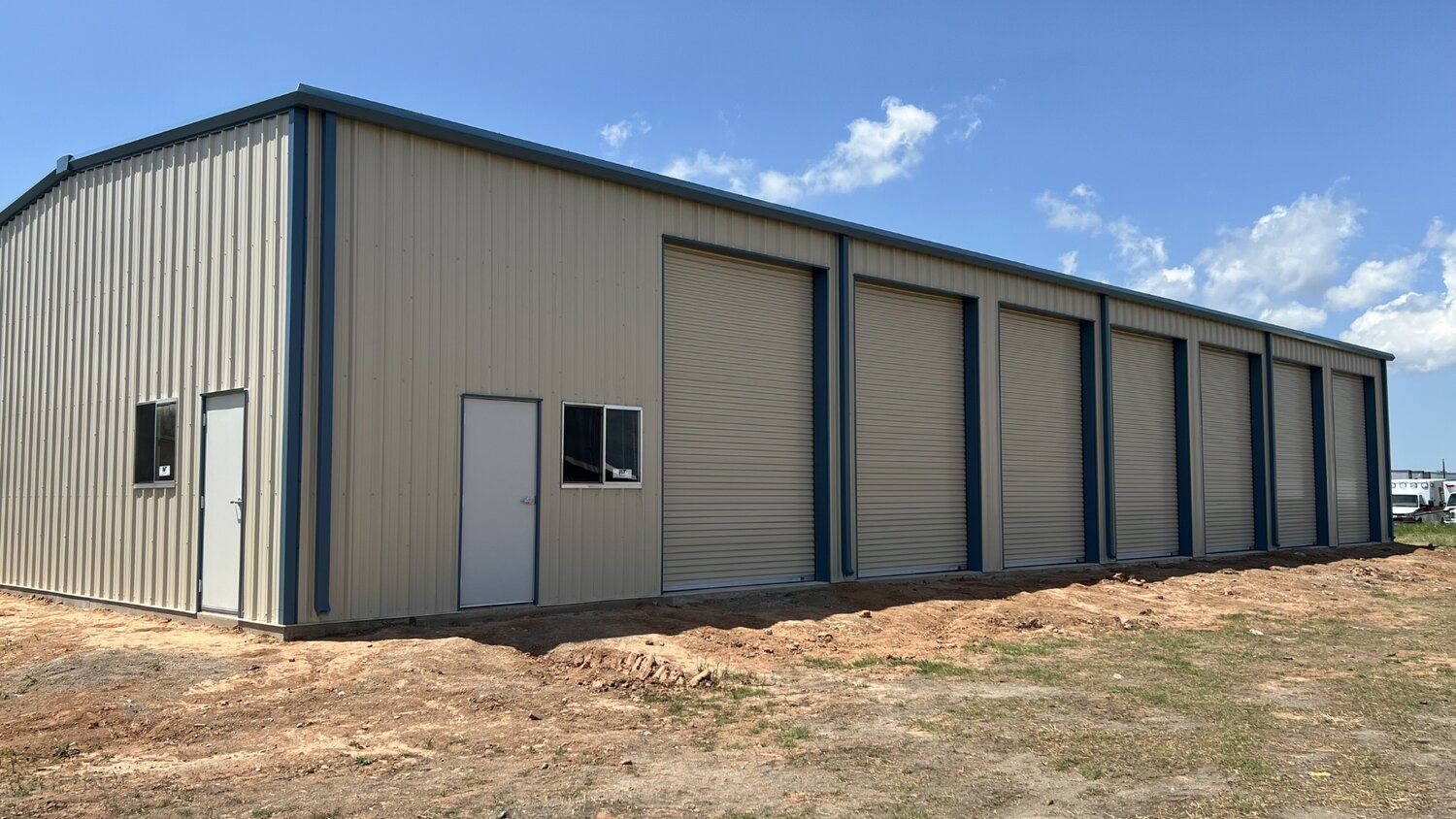 40x100x16-commercial-service-facility-front-corner-exterior-columbus-tx