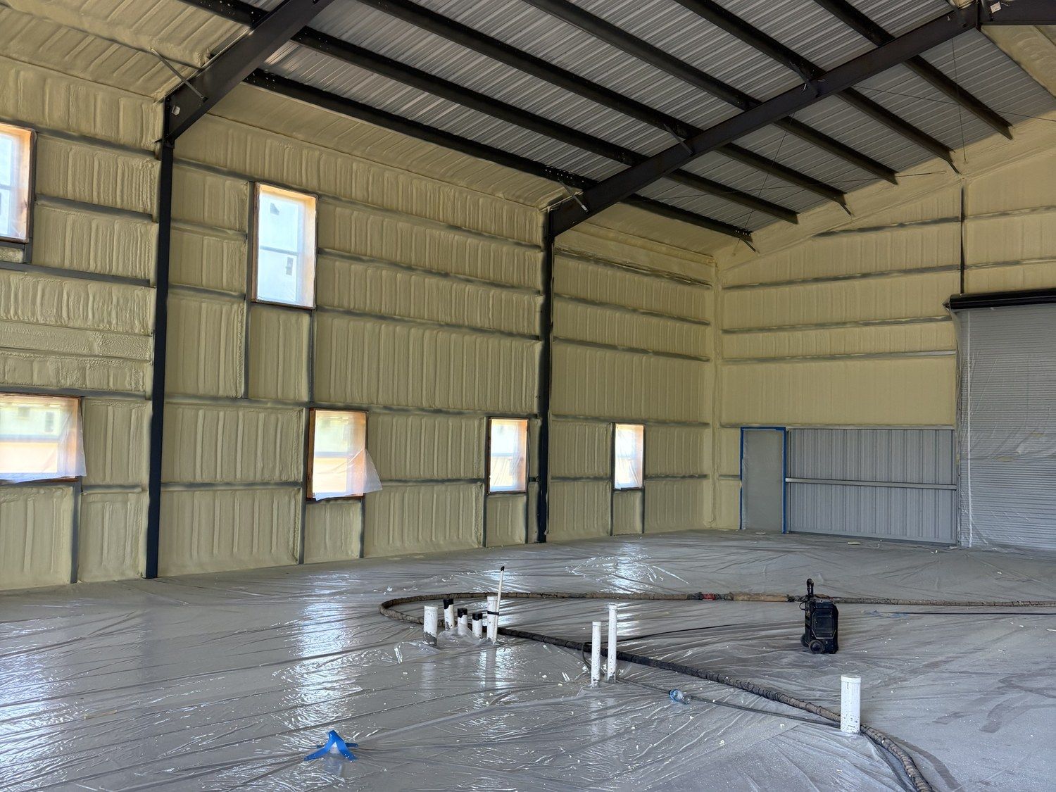 spray-foam-insulated-steel-building-interior-brookshire-tx