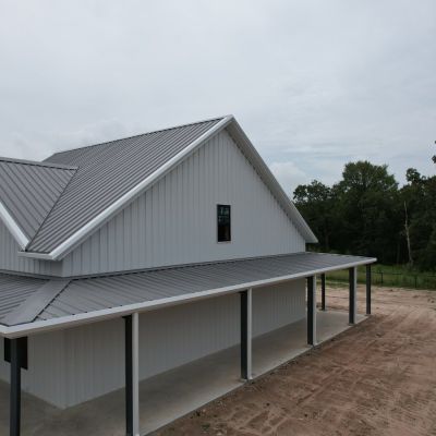 modern-metal-farmhouse-wraparound-porch-near-college-station-tx