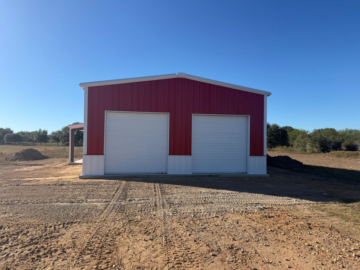 30x50x14-barndominium-roll-up-door-front-view-columbus-tx