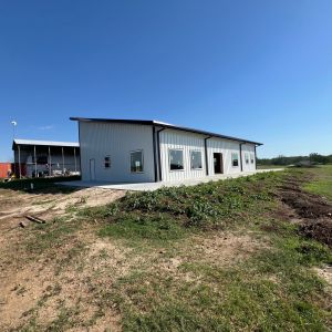 white-pre-engineered-metal-building-rural-property-texas