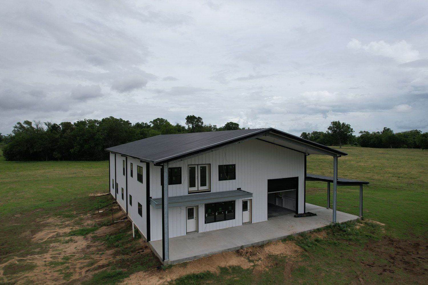 brookshire-tx-ranch-retreat-metal-building-shop-living-quarters
