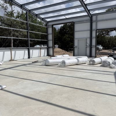 interior-barndominium-construction-with-insulation-rolls