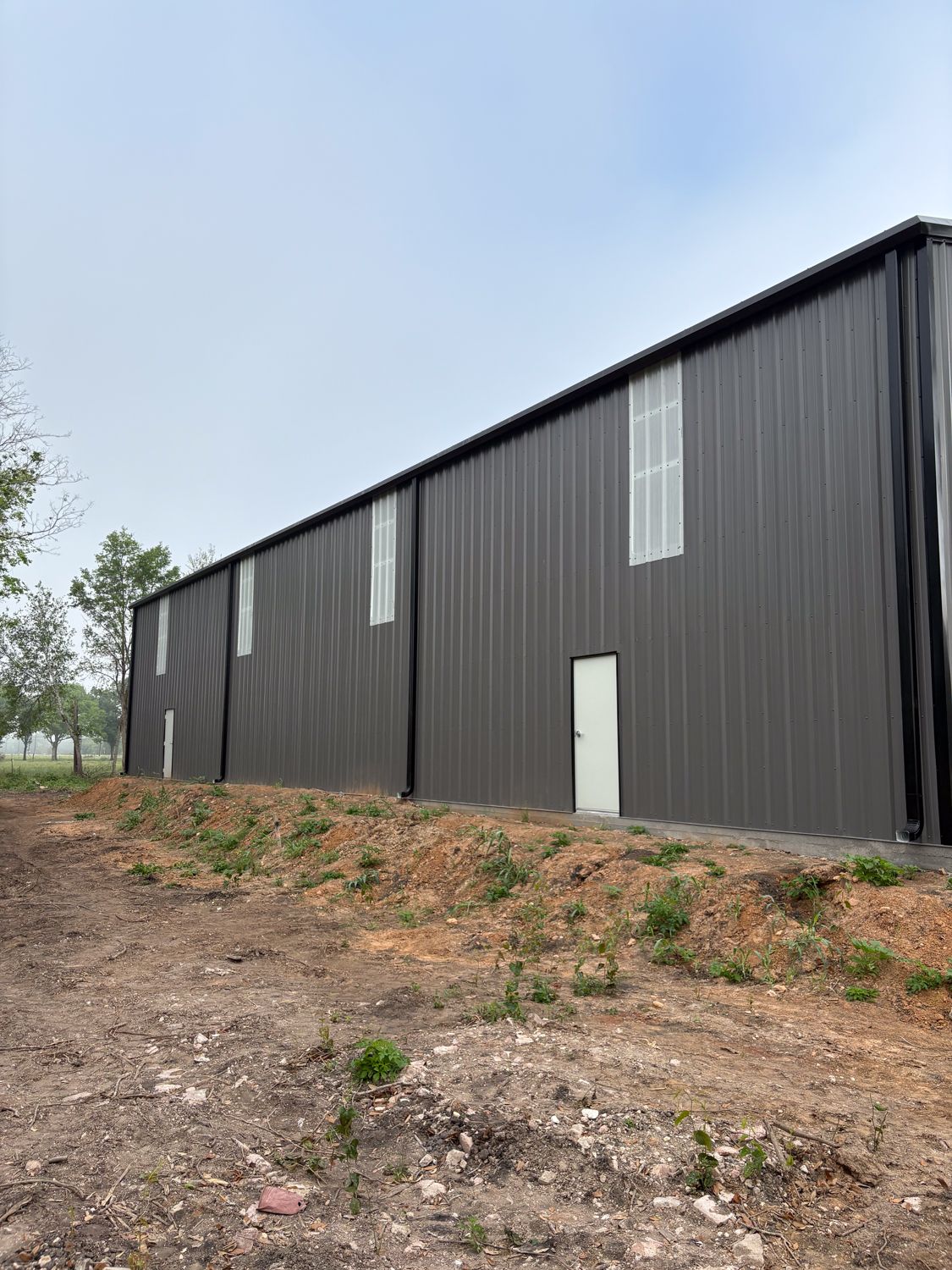 50x100-metal-building-rosenberg-tx-rollup-doors