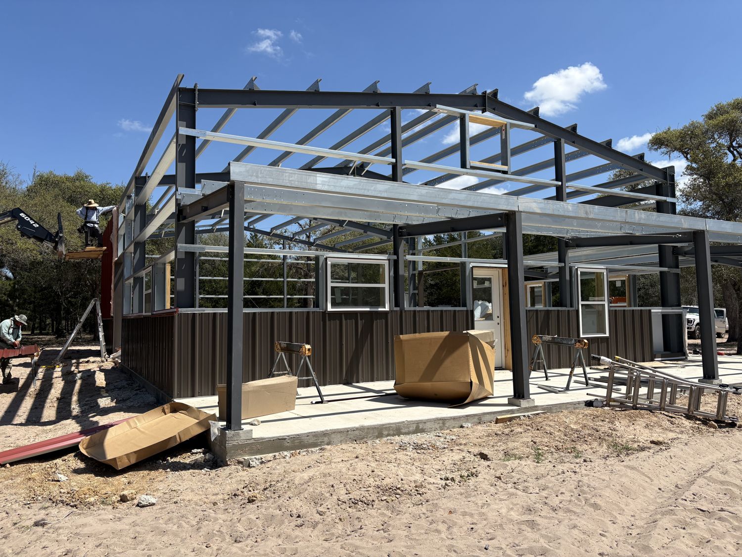 covered-porch-frame-on-ranch-barndominium