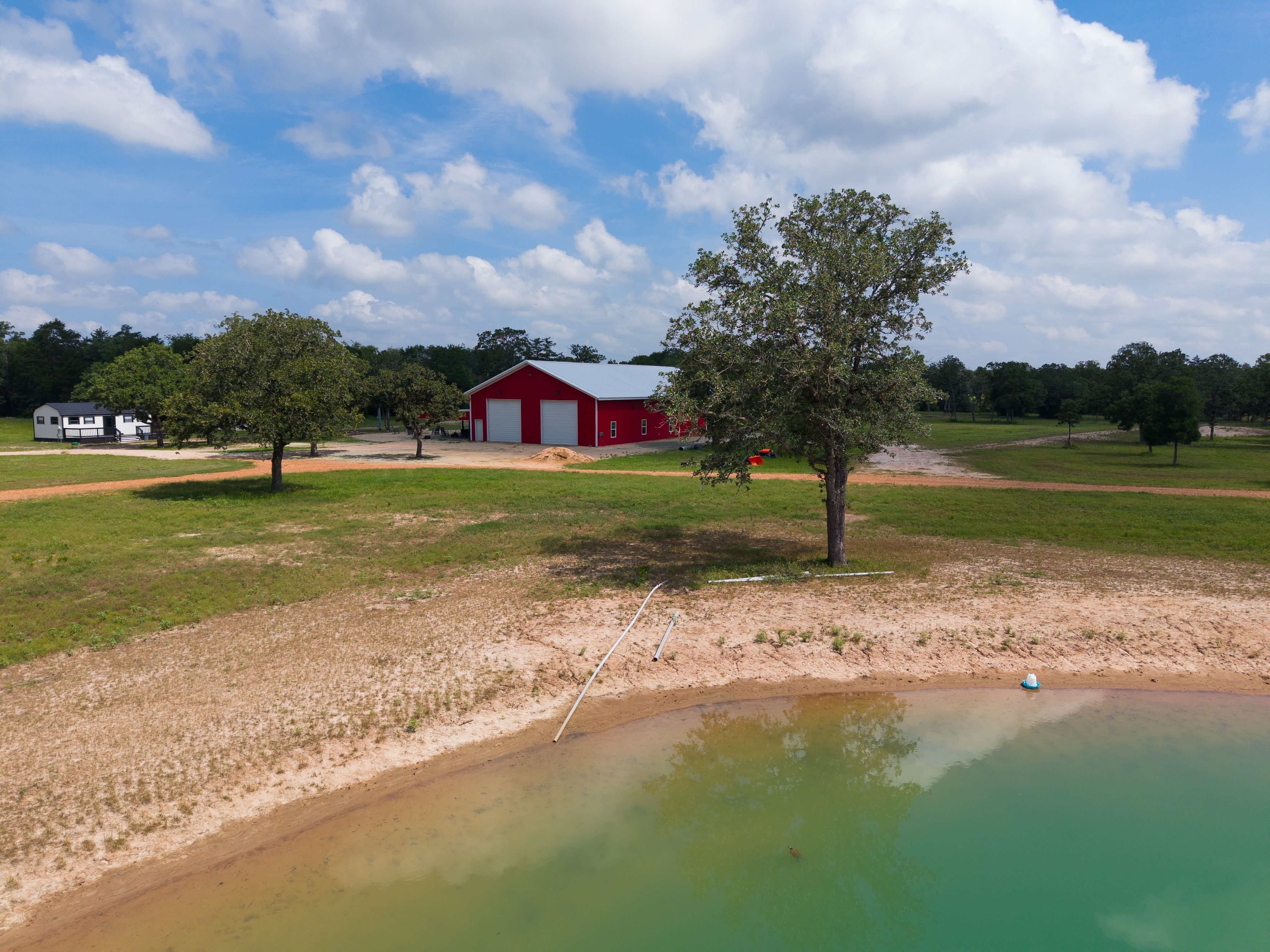 barndominium-overlooking-pond