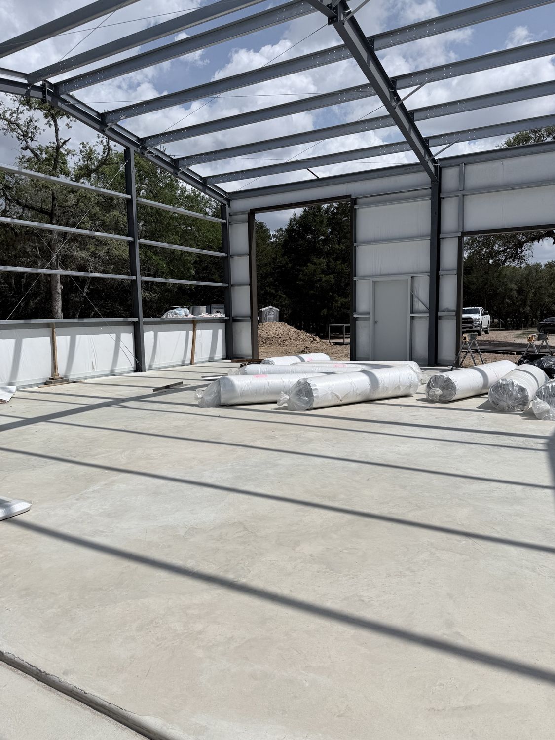 interior-barndominium-construction-with-insulation-rolls